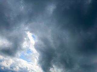 Naklejka na ściany i meble Thunderclouds cover the sky. Very beautiful clouds.