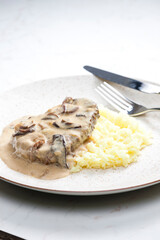 meat with mushroom sauce and white rice