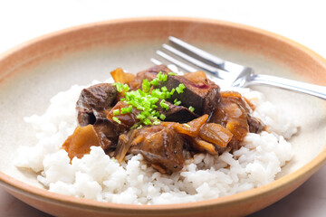 Chinese beef meat with soy sauce served with rice