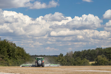 a tractor preparing the field