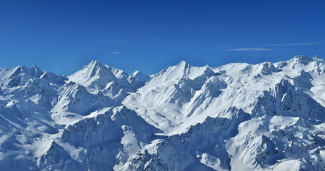 Fototapeta na wymiar Mountains covered with White snow,and blue sky panoramic.Generative AI illustration