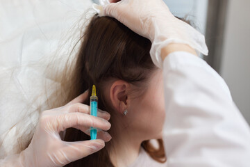 Plasma treatment, plasmolifting or PRP method point the introduction of the patient's own plasma...