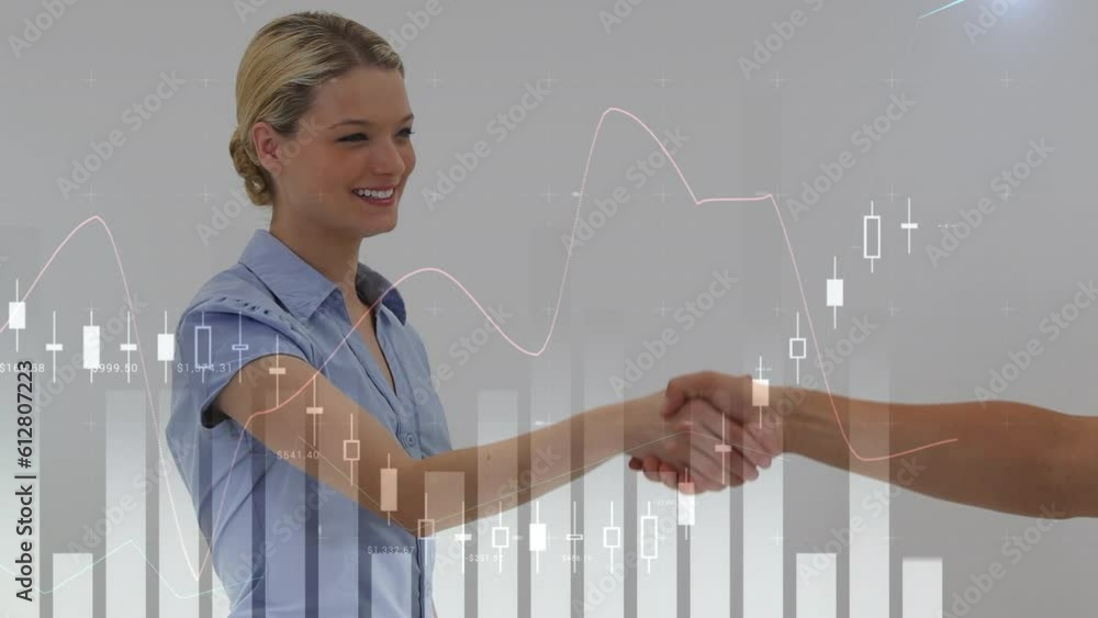 Wall mural Animation of financial data processing over caucasian businesspeople shaking hands