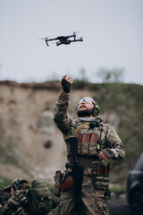 Portrait of Ukrainian military using a drone