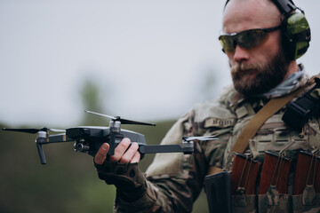 Ukrainian soldier using a drone for air intelligence