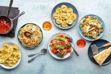 Pasta variety. Italian food and drinks, overhead flat lay shot. Spaghetti marinara, mushroom...