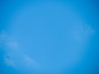 Fototapeta na wymiar Photo of a blue sky with small white clouds