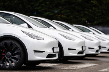 Electric vehicles awaiting preparation for sale