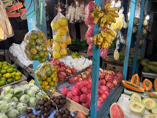 Fruit store on the street selling many kinds of assorted fresh fruit 