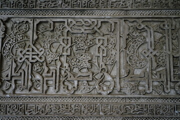 Decorated wall detail inside Real Alcazar de Seville, Andalucia, Spain