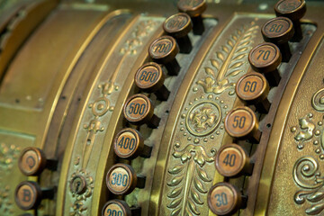 Old Cash Register in close up shot. Green National Cash Register with numbers and details. Antique...