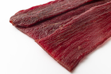 Fototapeta premium Beef jerky on a white background