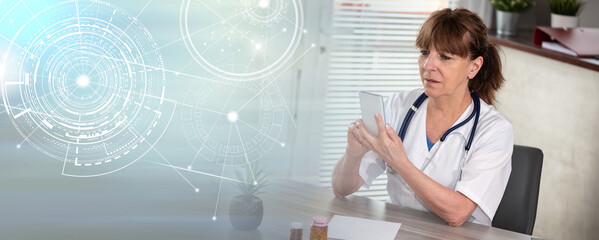 Female doctor using her mobile phone; panoramic banner