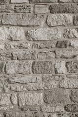 Texture of the wall of the ancient Russian fortress in Pskov. - obrazy, fototapety, plakaty