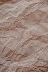 Crumpled Textured Paper Background on Brown Floor