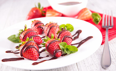 delicious strawberries and chocolate sauce
