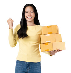 Smiling asian woman hands holding cardboard boxes with fists clenched celebrating victory expressing success on white background.