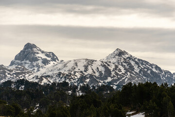 Mountain range with snowcapped peaks in Baqueira ski fields, Catalonia pyrenees