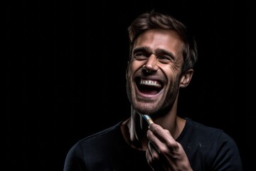 Fototapeta premium Headshot portrait photography of a joyful boy in his 30s brushing her teeth with a toothbrush against a matte black background. With generative AI technology
