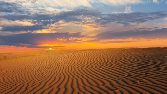  sandy desert at the dramatic sunset time lapse scene