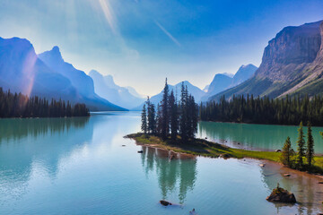 World famous and Iconic Spirit Island, a holy place for the Stoney Nakoda First nation, on Maligne Lake in Jasper National Park in the Canada rockies - obrazy, fototapety, plakaty