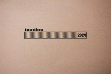 Loading 2024 symbol on paper. New year 2024 coming concept.