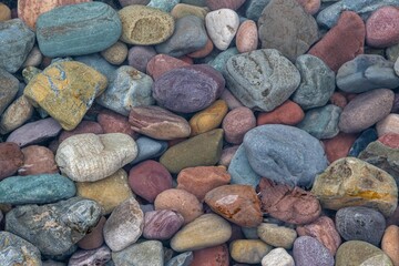 Abstract of colored stones under water. Background. 