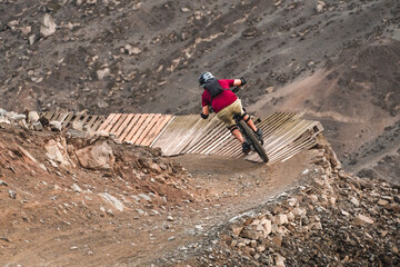 cyclist practicing mountain biking, enduro.