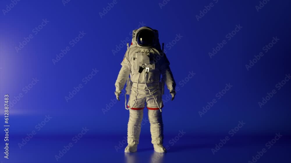 Poster abstract space concept. the astronaut stands on a blue isolated background with changing lighting. c