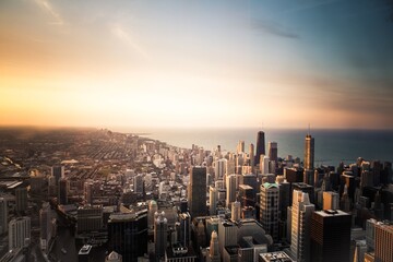 View of Chicago skyline from Willis Tower at sunset, looking north-northeast