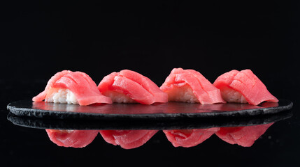 Sushi of Japanese, Salmon Roll Sushi. Collection of sushi on dark background, sushi is a Japanese...