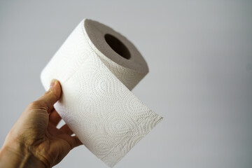 toilet papier in human's hands