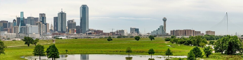 Dallas skyline looking from flooded Trinity River in 4k 