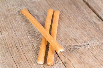 bread sticks grissini on wooden background