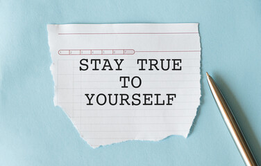 Old vintage blue background with handwritten text - STAY TRUE TO YOURSELF means to have self...