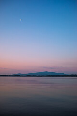 Sunrise Mietkow Lake, Poland view on Sleza Mountain