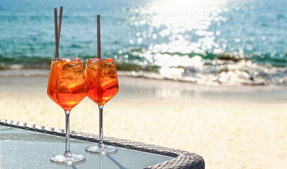 two aperol spritz on a summer evening in a mediterranean restaurant