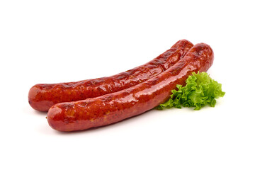 German grilled pork sausages with tomato sauce, close-up, isolated on white background.
