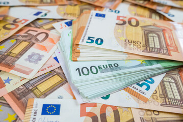 Fototapeta na wymiar Euro banknotes, various denominations,