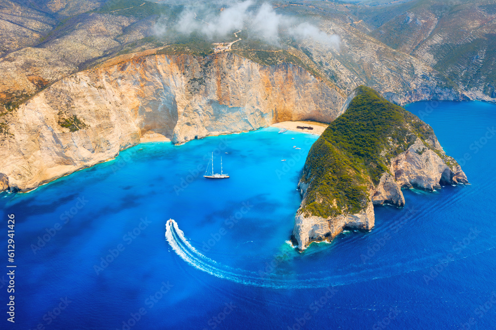 Wall mural view of navagio beach, zakynthos island, greece. aerial landscape. azure sea water. top view from a 