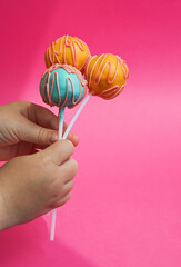 cake pops in chocolate glaze. sweet dessert, homemade cakes. background for the design.