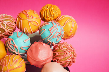 cake pops in chocolate glaze. sweet dessert, homemade cakes. background for the design.