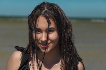 young asian woman with wet hair