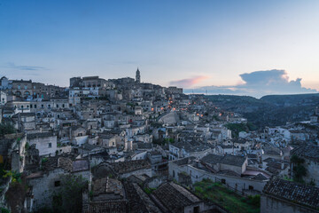 Obraz premium Matera city skyline, the ancient town of Matera at sunrise or sunset, Matera, Italy