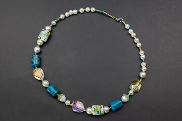 Unique colorful gemstone necklace, handmade jewelry concept, promotional photo for an online jewelry store