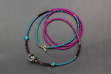 Unique colorful gemstone necklace, handmade jewelry concept, promotional photo for an online jewelry store