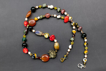 Unique colorful gemstone necklace, handmade jewelry concept, promotional photo for an online...