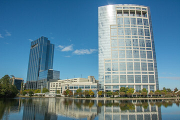 The view in Woodlands Town Center located in Montgomery County, Texas, USA with modern glass buildings and waterway