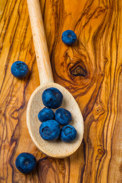 Wooden Spoon And Blueberries