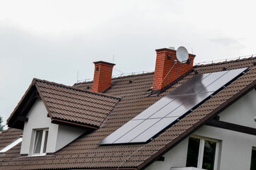 Installing a Solar Cell on a Roof.